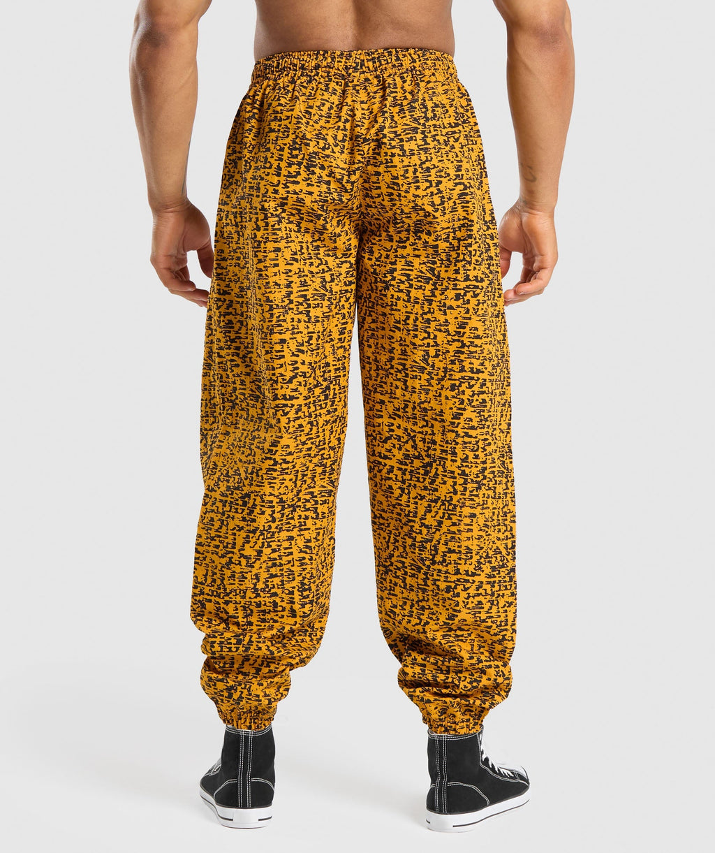 gymshark-printed-pumper-pants-burnt-yellow-ss24