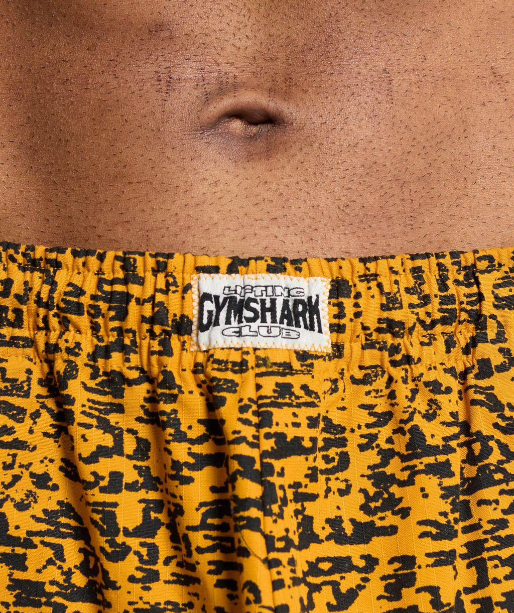gymshark-printed-pumper-pants-burnt-yellow-ss24