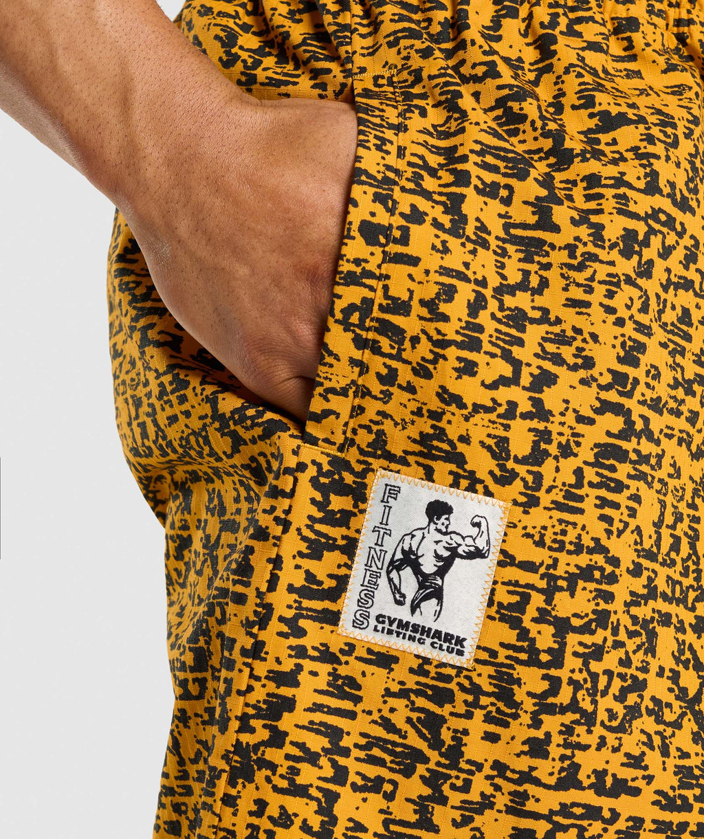 gymshark-printed-pumper-pants-burnt-yellow-ss24