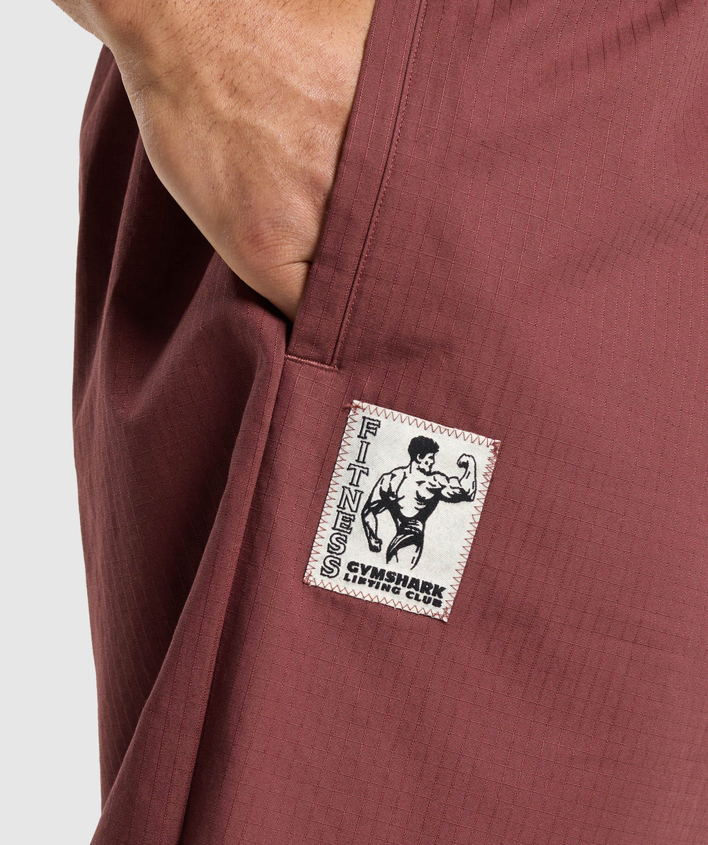 gymshark-pumper-pants-burgundy-brown-ss24