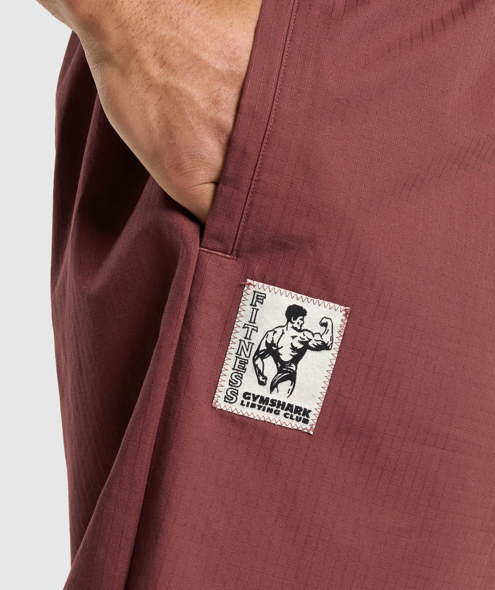 gymshark-pumper-pants-burgundy-brown-ss24