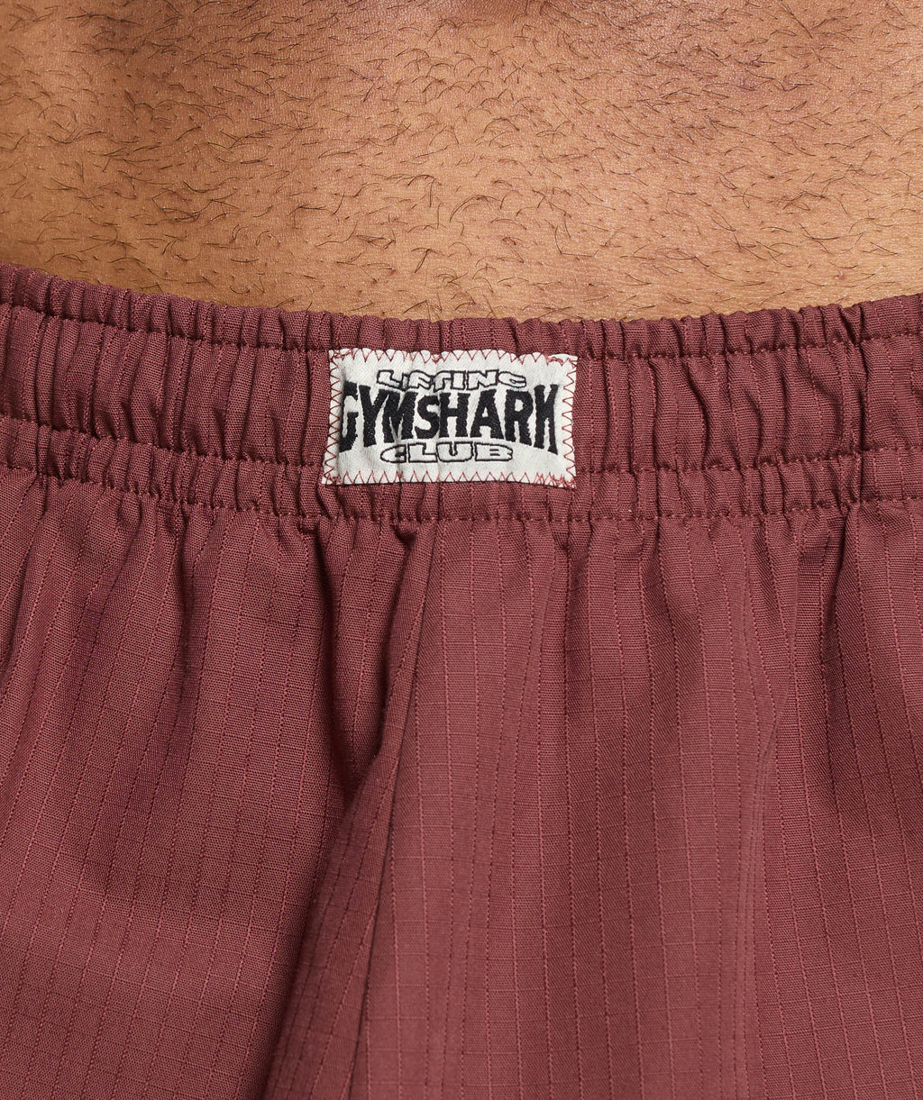 gymshark-pumper-pants-burgundy-brown-ss24