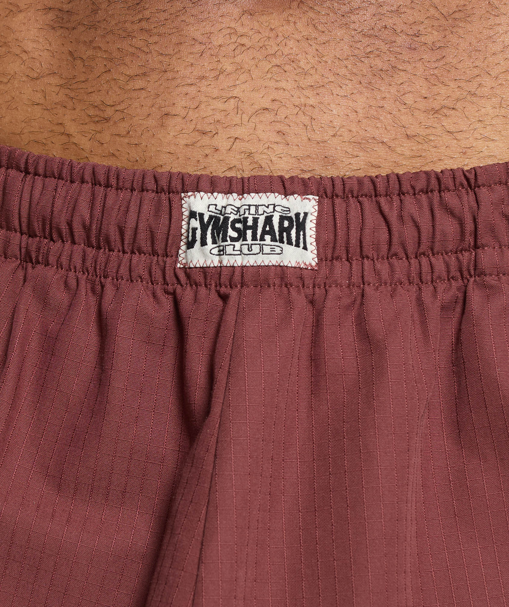 gymshark-pumper-pants-burgundy-brown-ss24