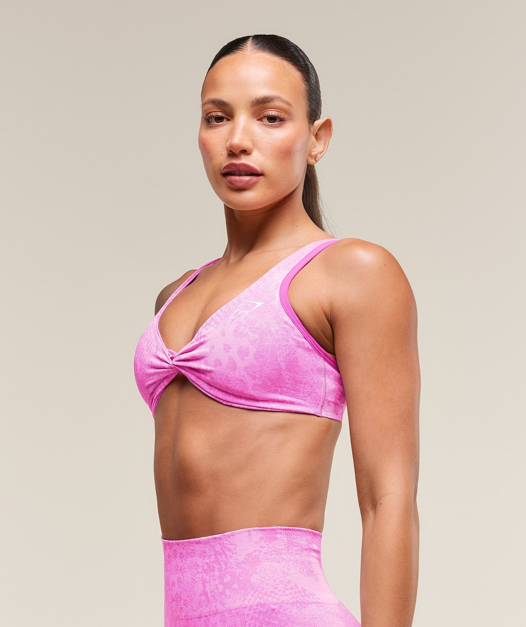 gymshark-adapt-x-whitney-animal-seamless-twist-front-bra-sour-pink-vibrant-pink-ss25