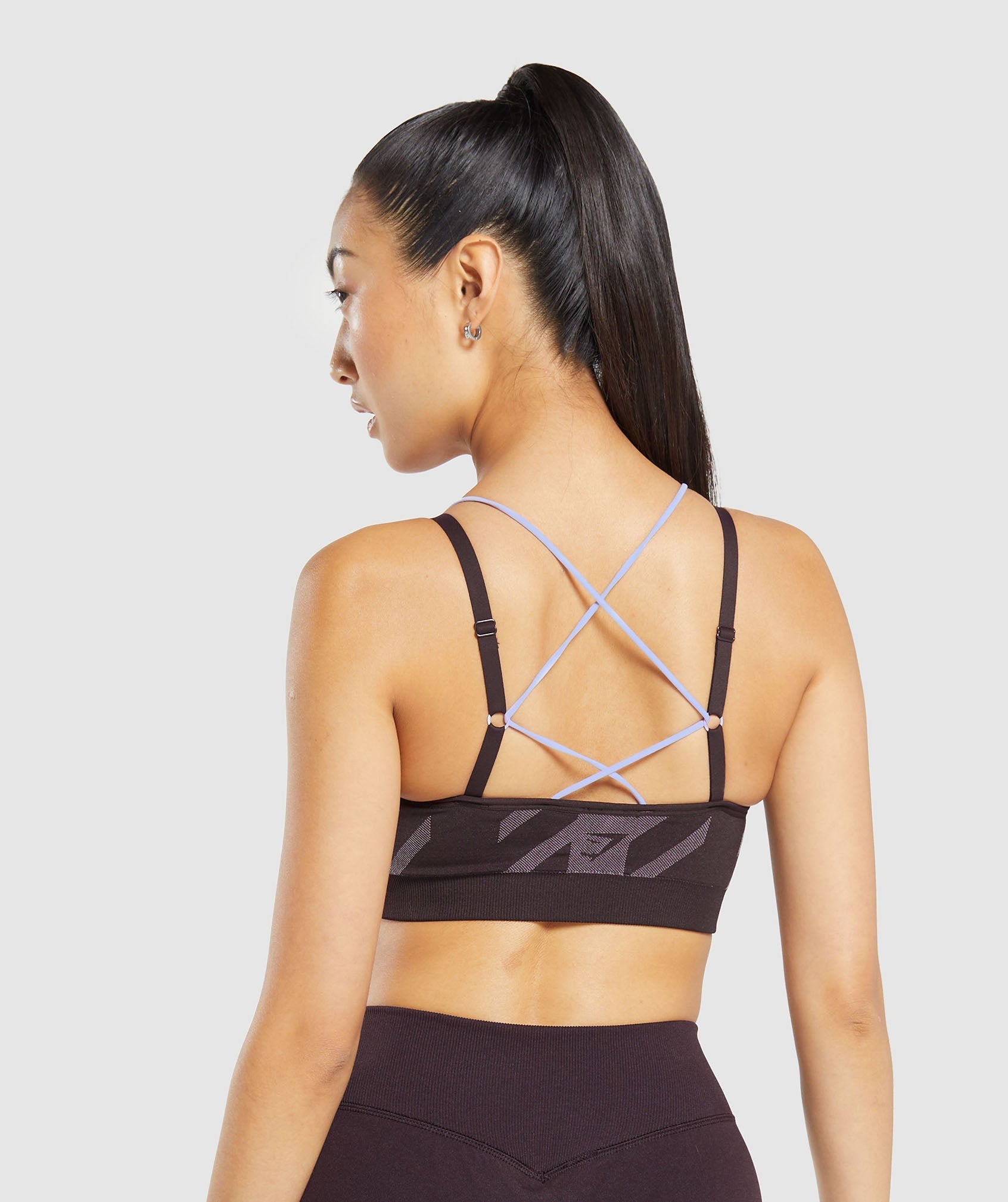 gymshark-apex-limit-seamless-ruched-sports-bra-plum-brown-powder-lilac-aw23