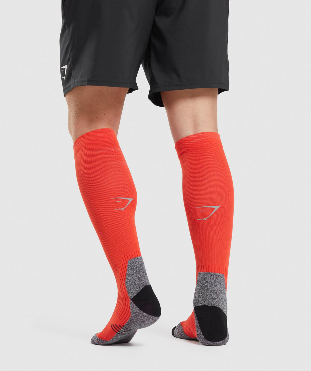 gymshark-long-performance-socks-papaya-orange-ss22