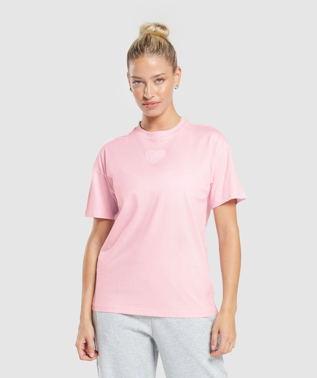 gymshark-love-hearts-oversized-t-shirt-dolly-pink-aw23