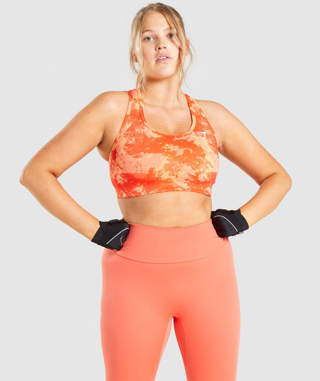gymshark-essential-racerback-training-sports-bra-orange-camo-print
