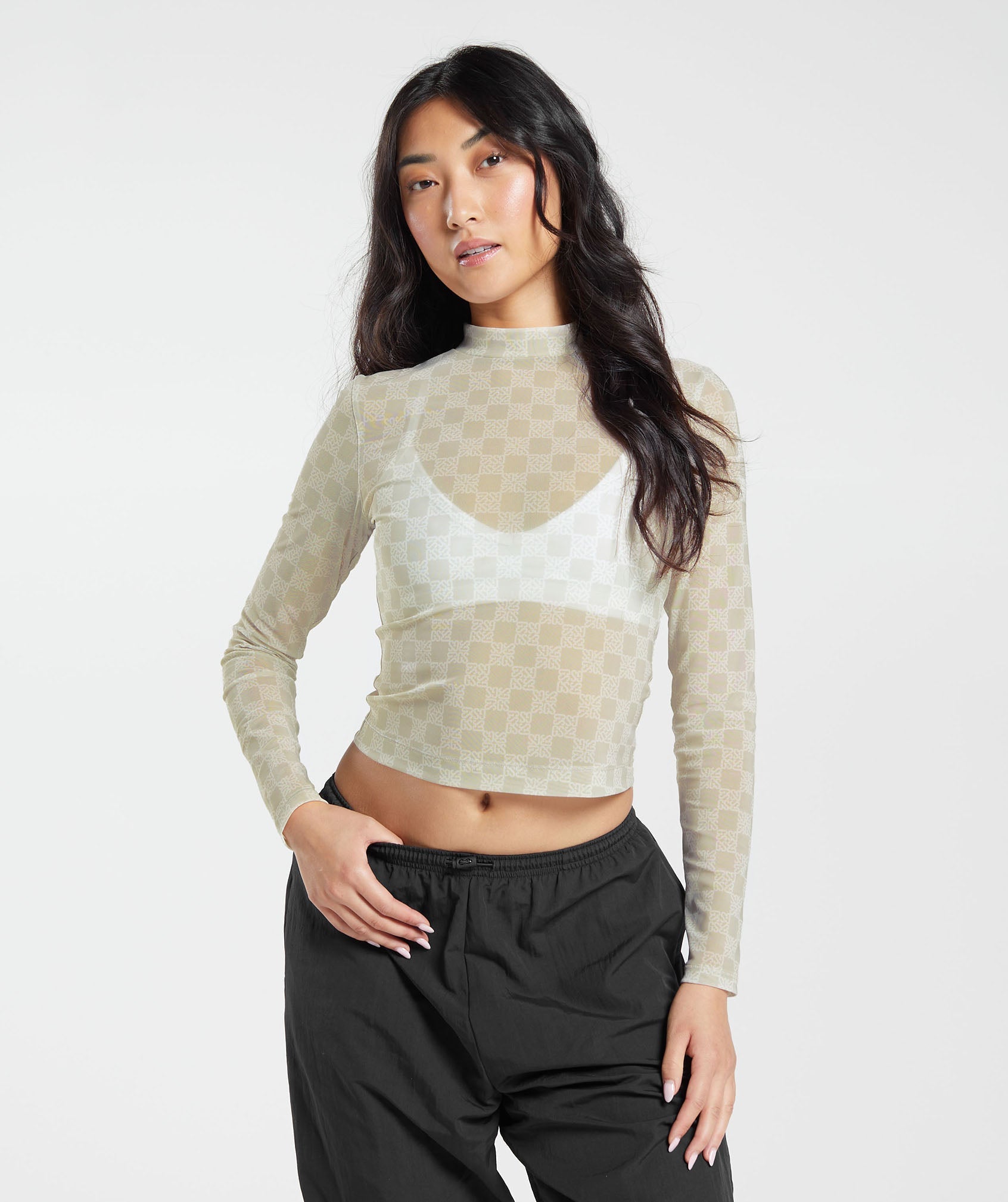 gymshark-monogram-mesh-long-sleeve-top-vanilla-white-aw23