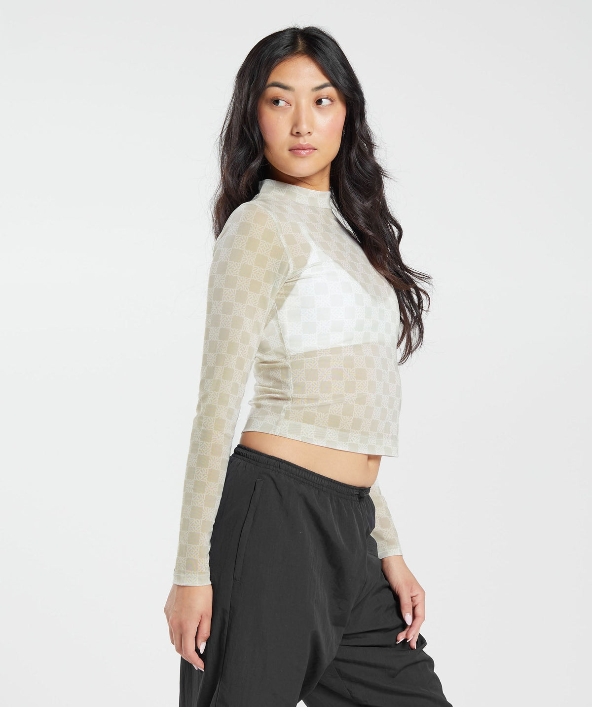 gymshark-monogram-mesh-long-sleeve-top-vanilla-white-aw23