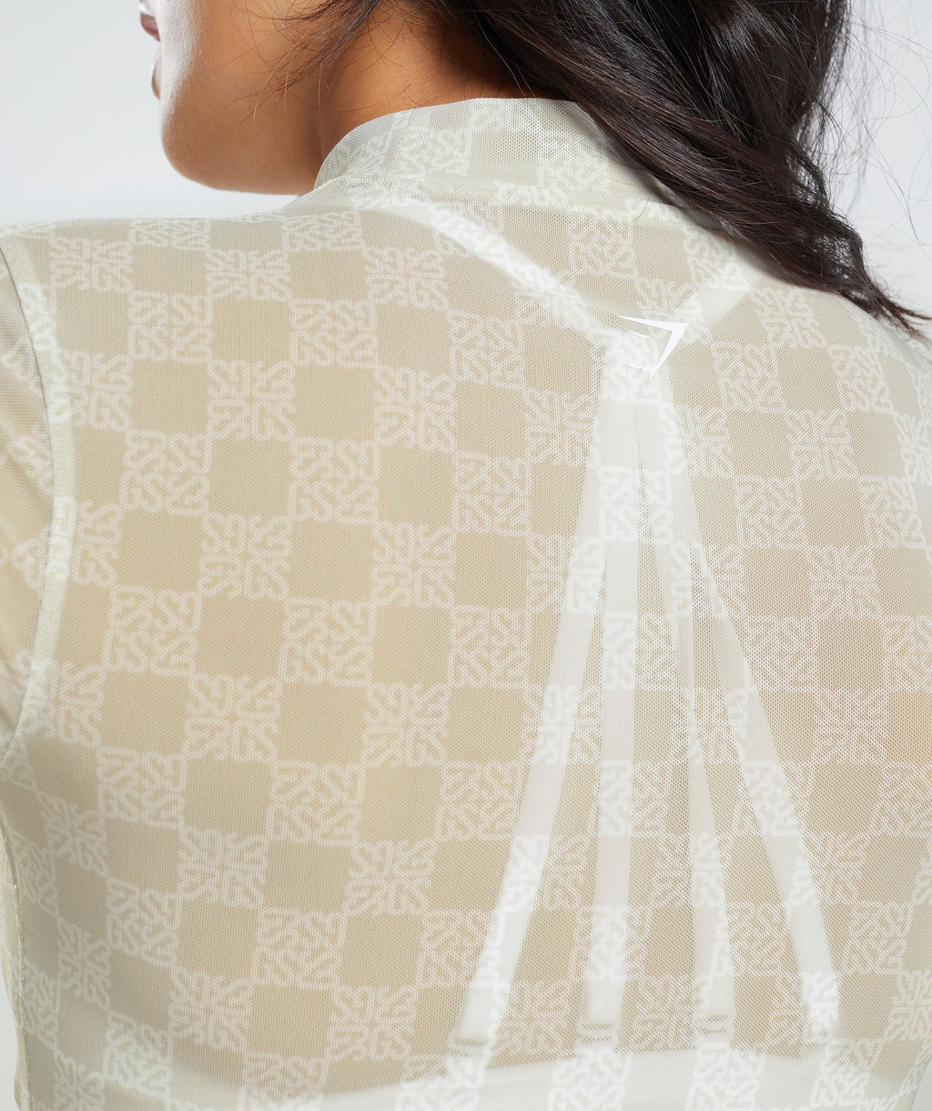 gymshark-monogram-mesh-long-sleeve-top-vanilla-white-aw23