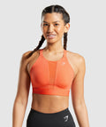 gymshark-mesh-neckline-2-0-sports-bra-papaya-orange-ss22
