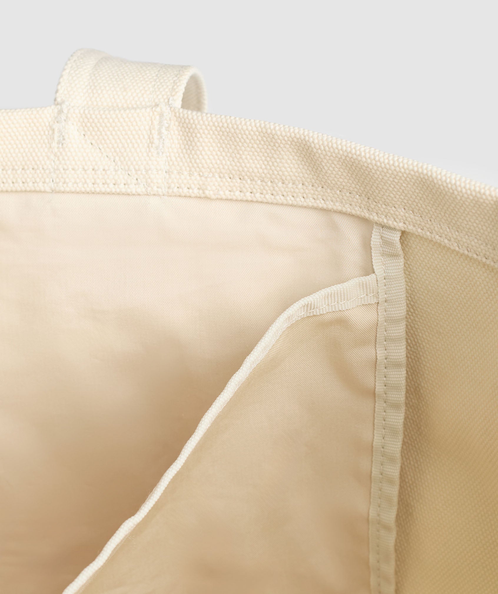 gymshark-tactical-canvas-tote-bag-ecru-white-ss24