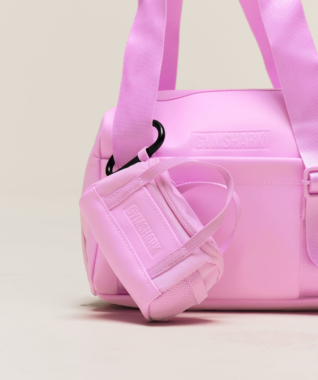gymshark-mini-everyday-holdall-keychain-sour-pink-ss25