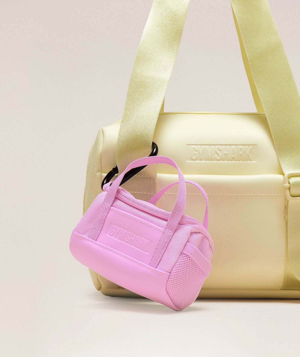 gymshark-mini-everyday-holdall-keychain-sour-pink-ss25