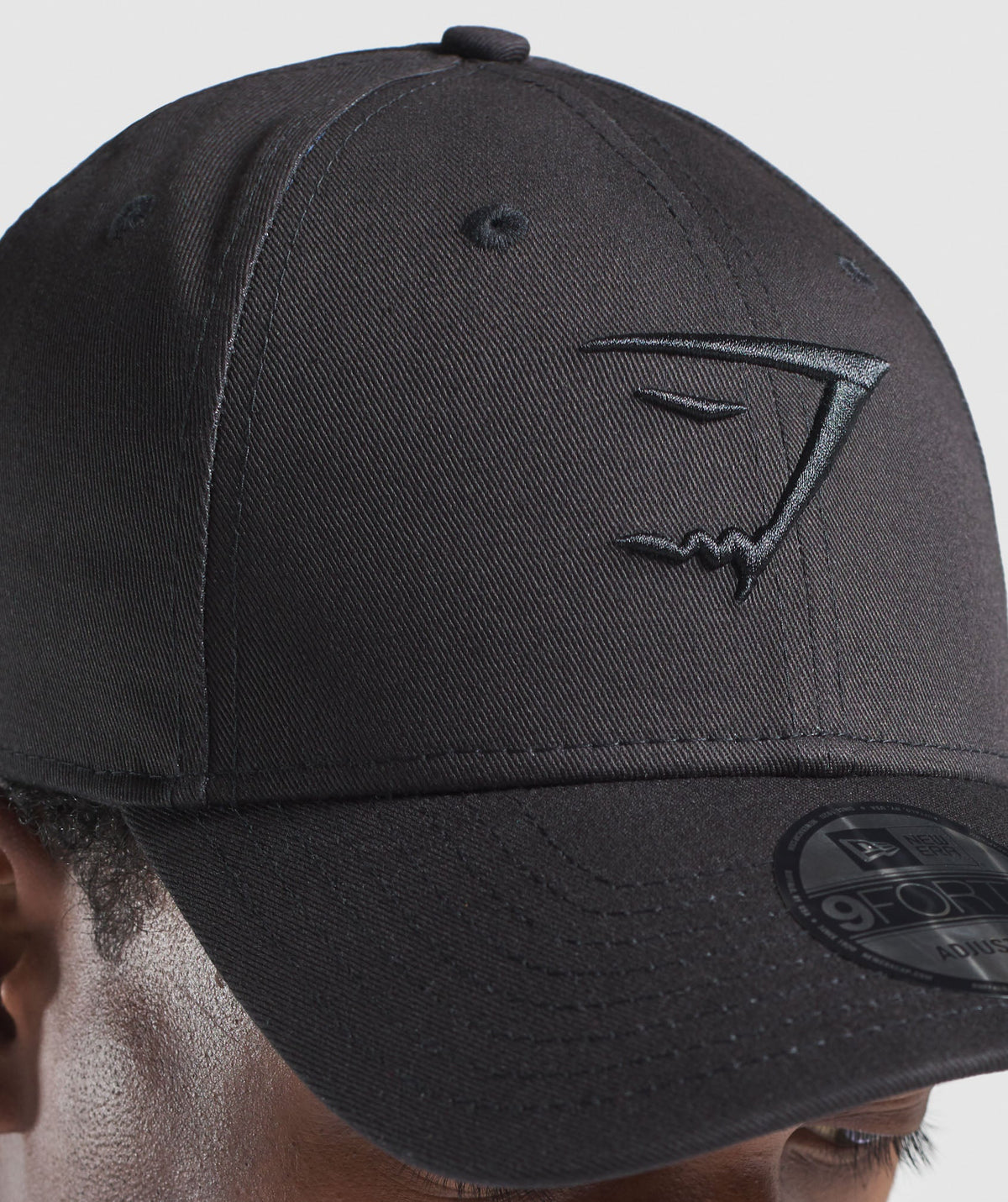 gymshark-new-era-9forty-trucker-black-black-aw21