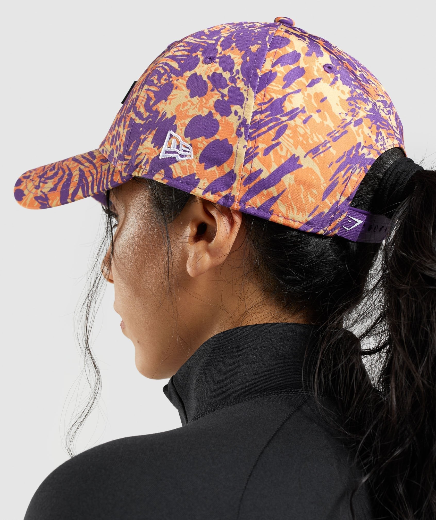 gymshark-animal-print-snapback-orange-print-aw21