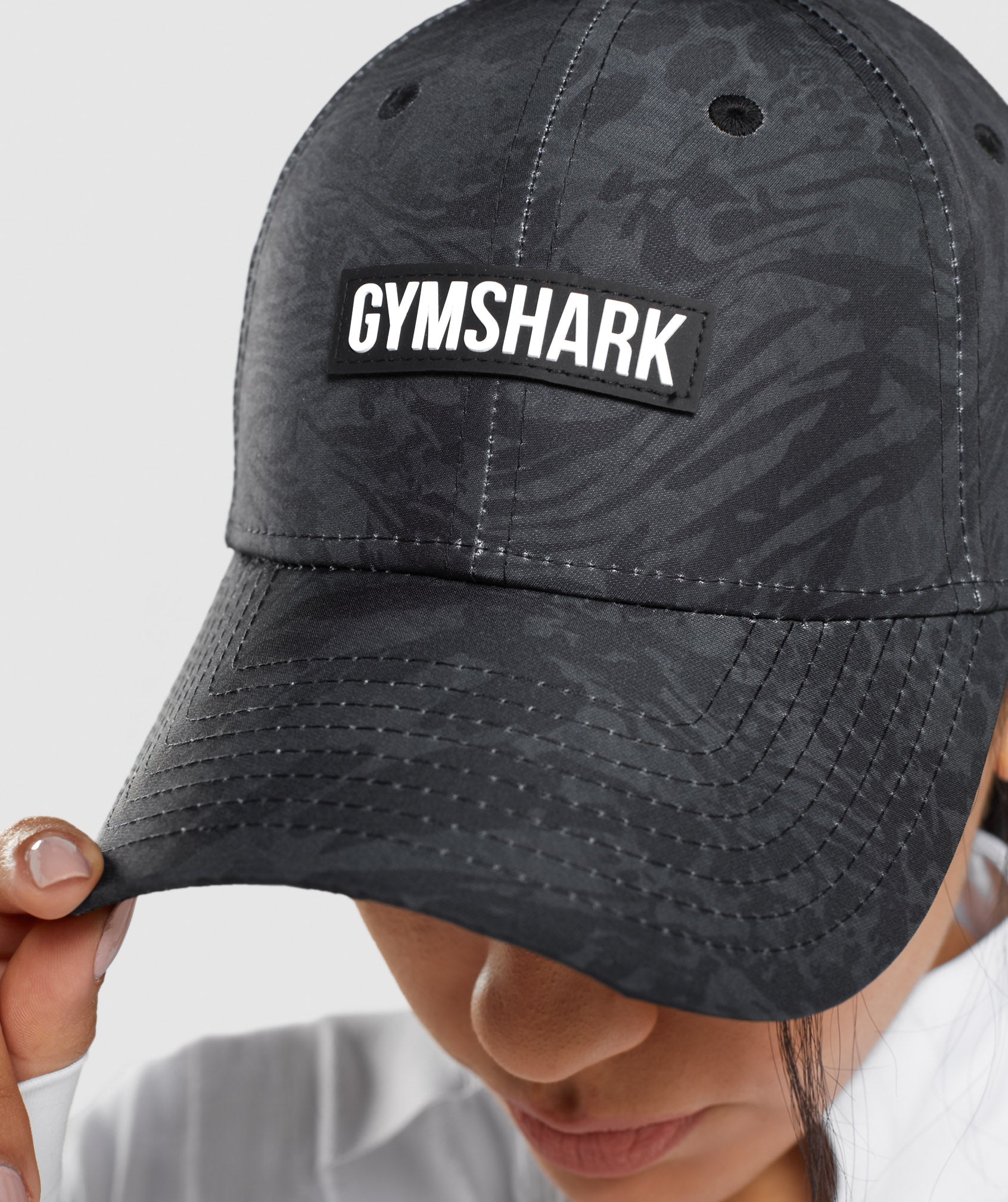gymshark-animal-print-snapback-black-aw21