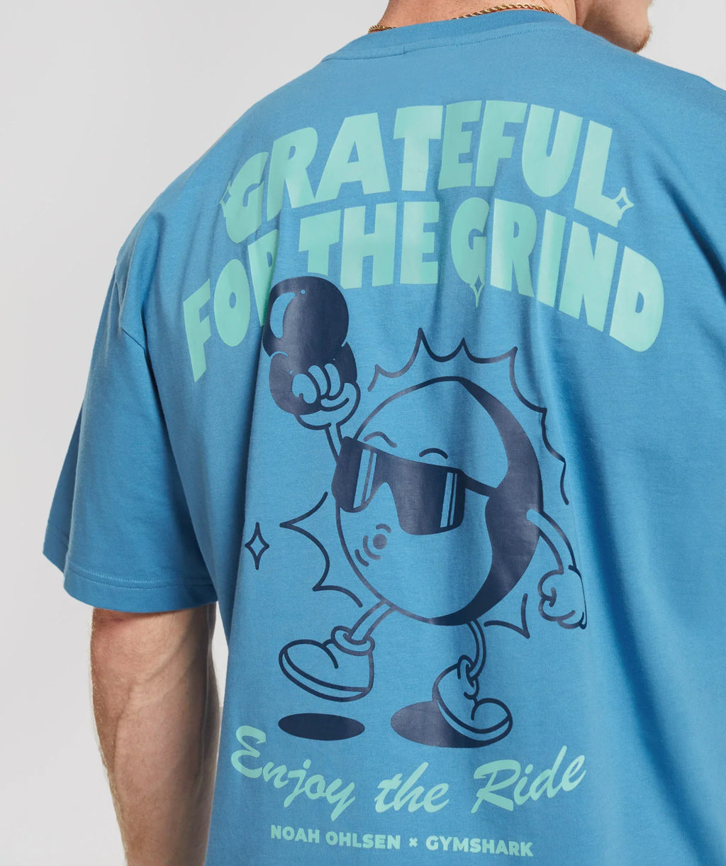 gymshark-noah-ohlsen-oversized-sun-t-shirt-coastal-blue-ss23