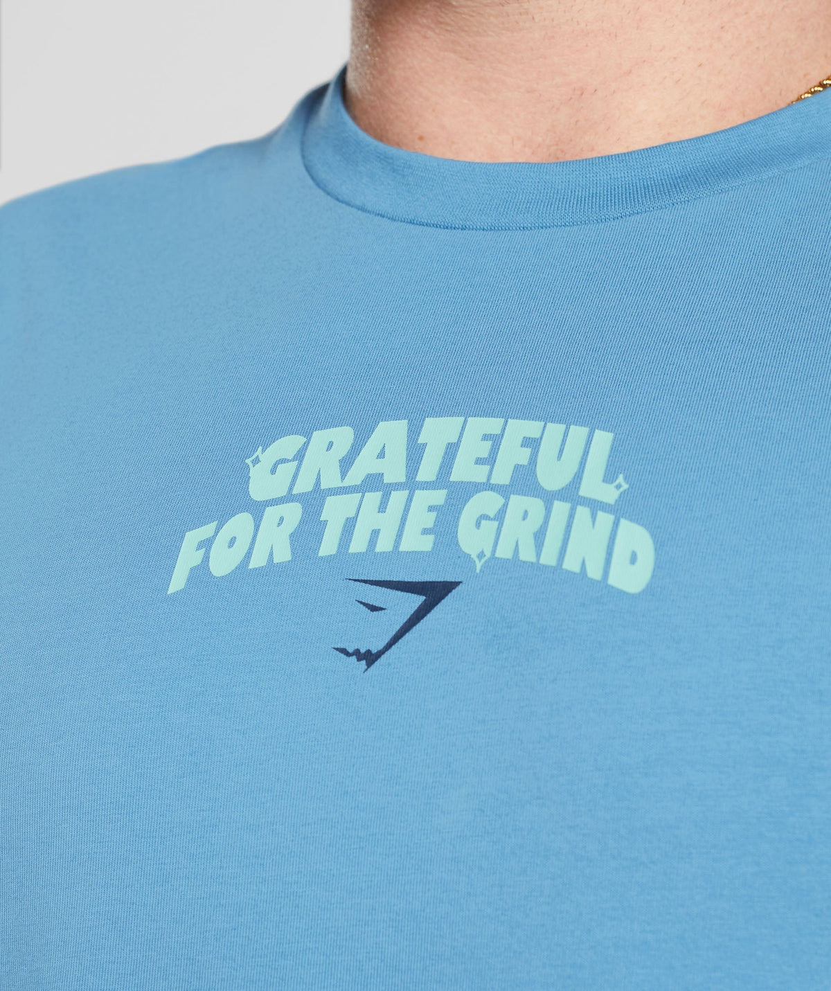 gymshark-noah-ohlsen-oversized-sun-t-shirt-coastal-blue-ss23