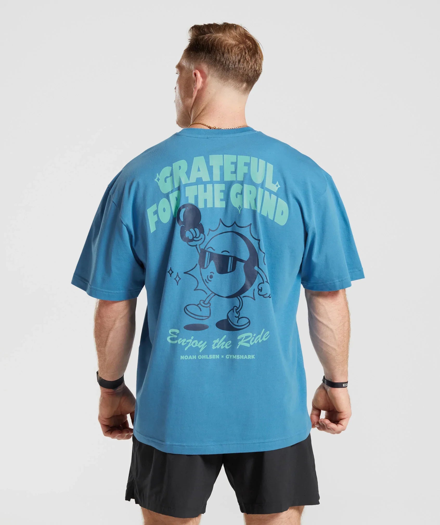 gymshark-noah-ohlsen-oversized-sun-t-shirt-coastal-blue-ss23