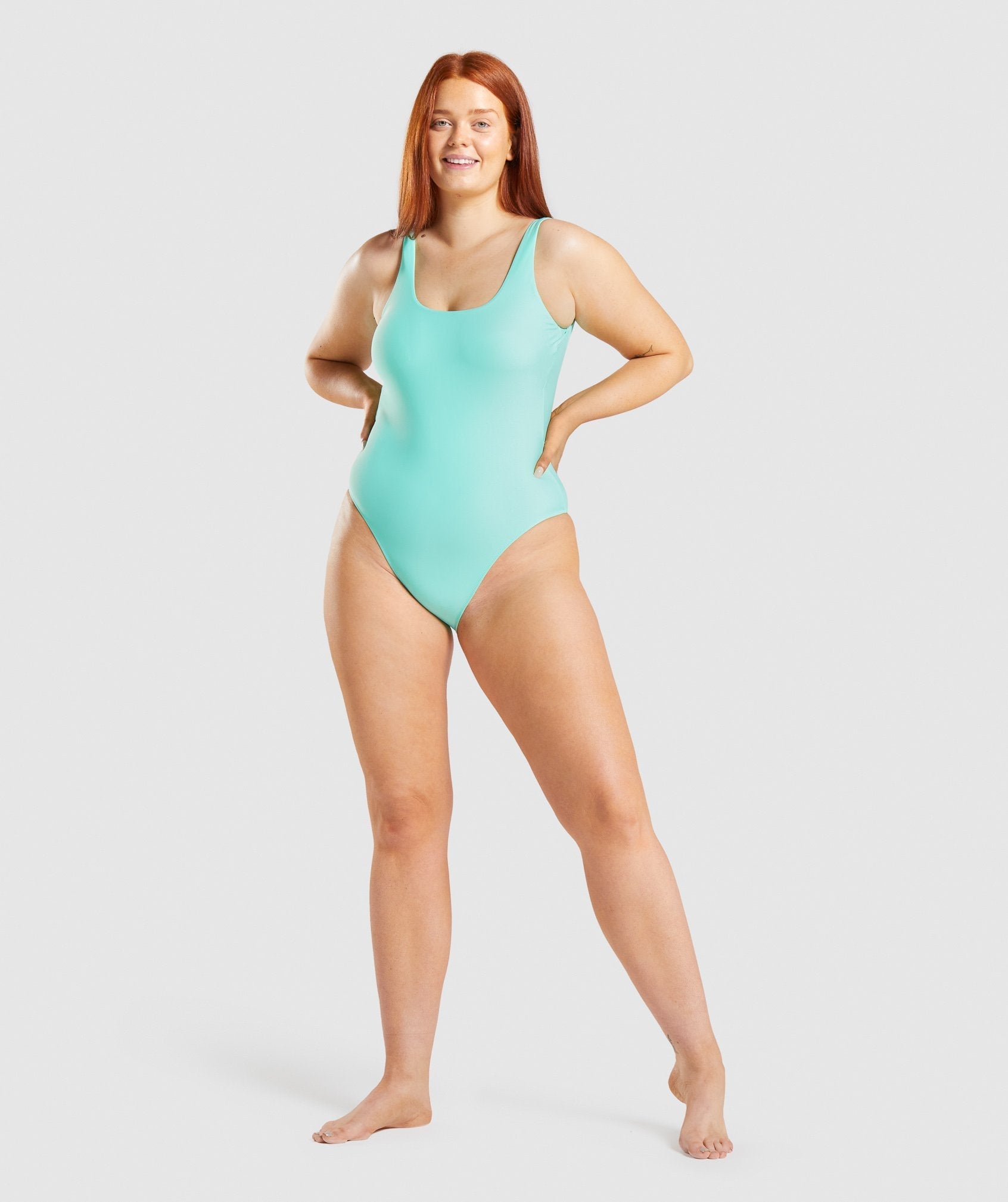 gymshark-open-back-swimsuit-turquoise