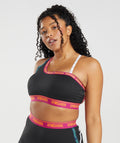 gymshark-strike-sports-bra-black-dragon-pink-alpine-green-ss22