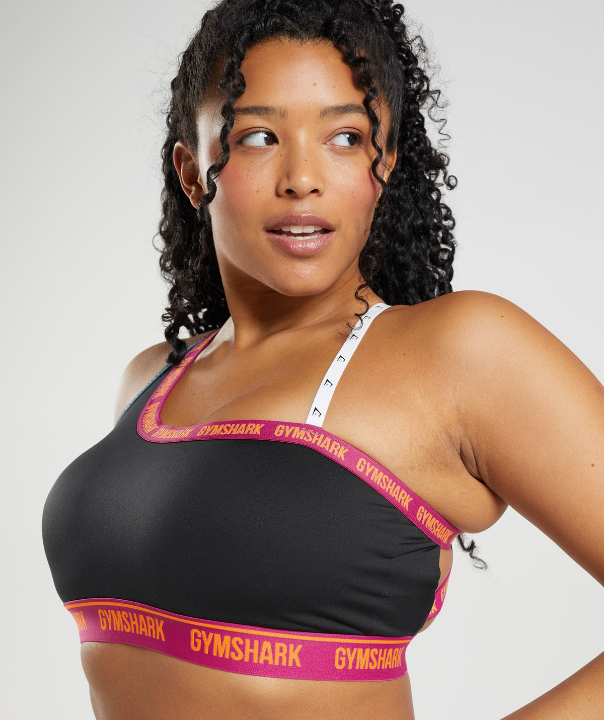 gymshark-strike-sports-bra-black-dragon-pink-alpine-green-ss22