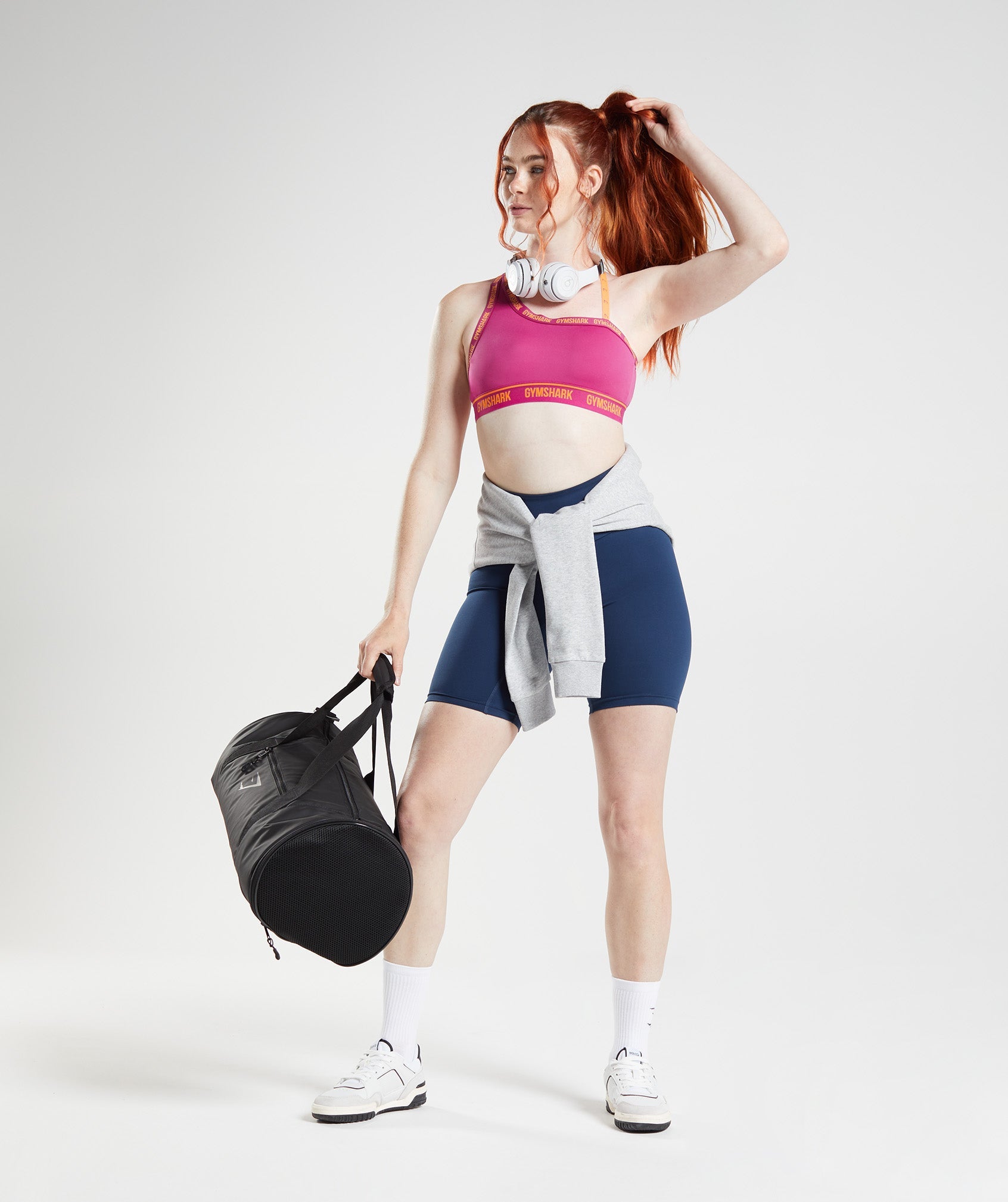 gymshark-strike-sports-bra-dragon-pink-horizon-orange-ss22