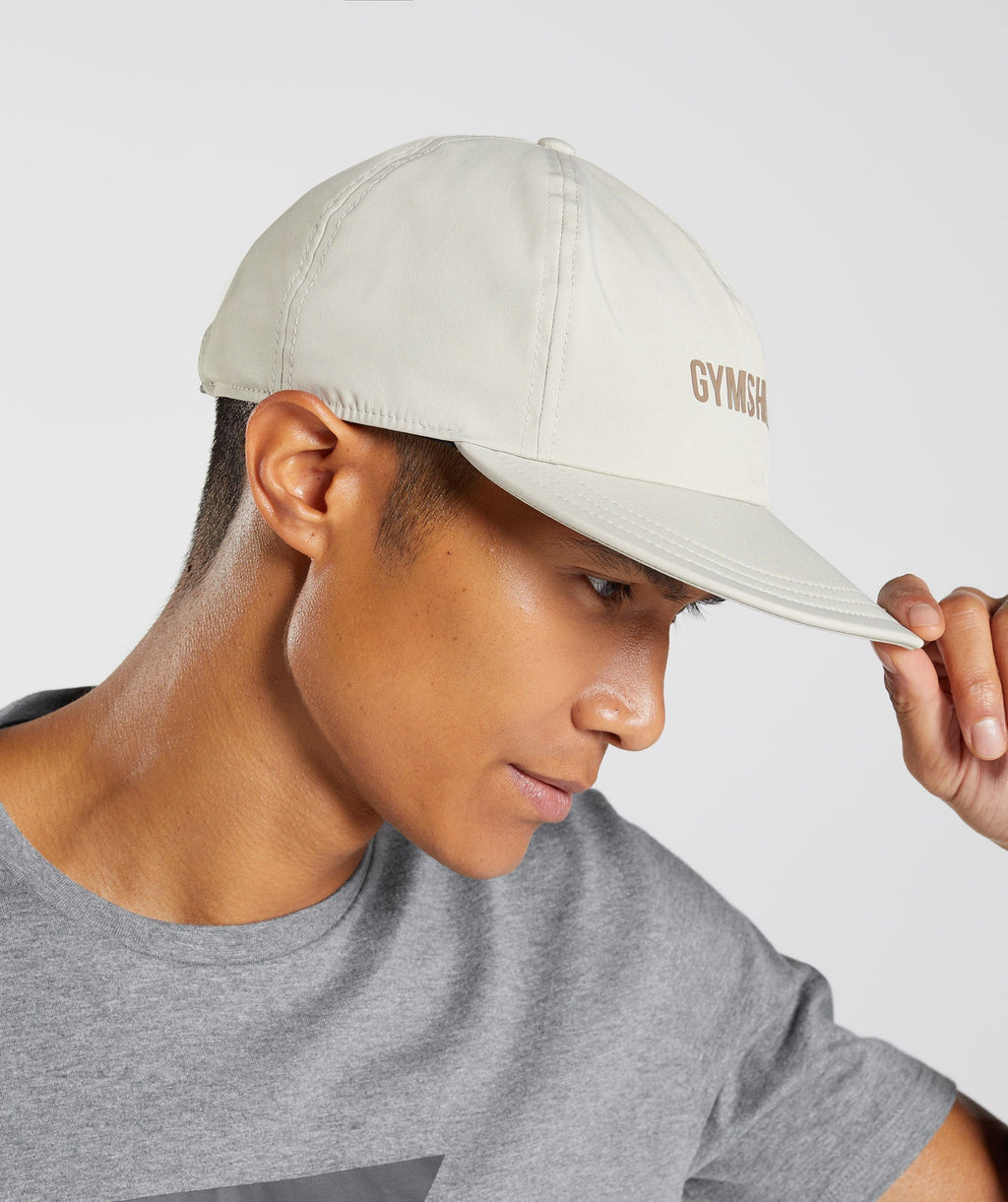 gymshark-flat-peak-cap-pebble-grey-aw22