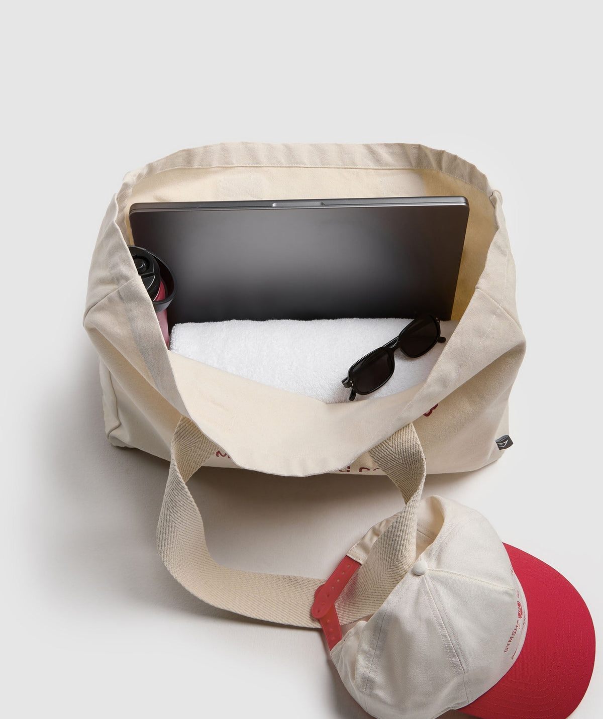 gymshark-weight-plate-oversized-tote-oat-white-carmine-red-ss25