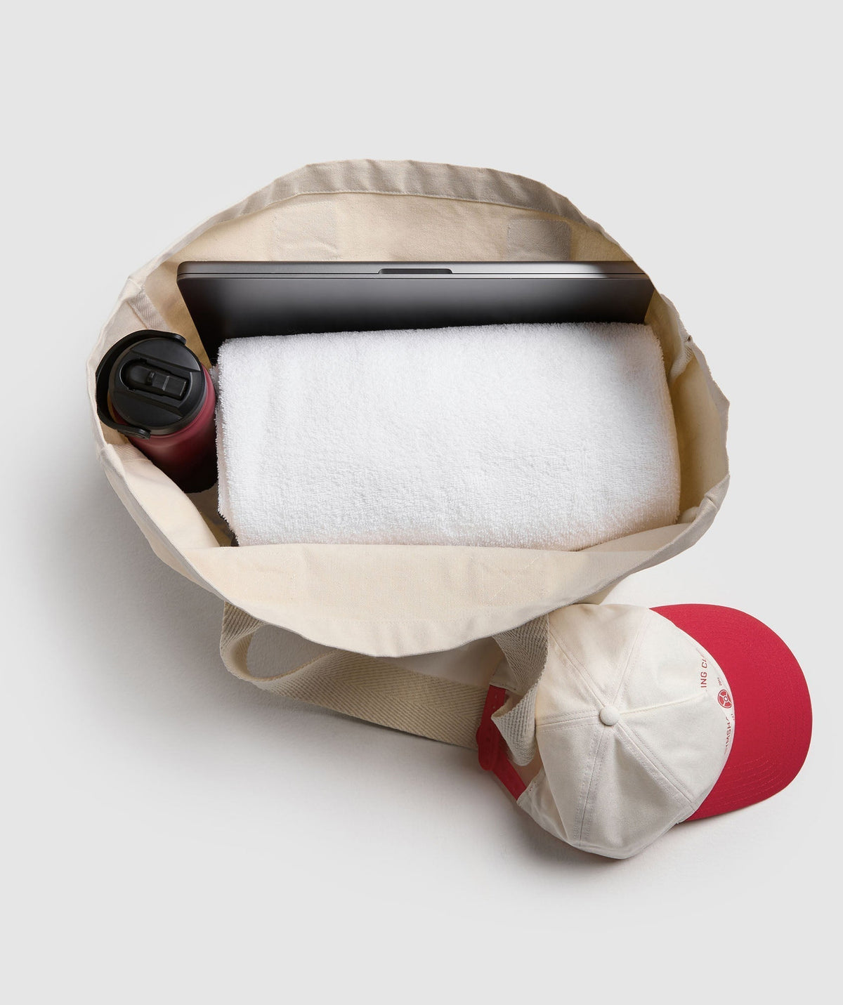 gymshark-weight-plate-oversized-tote-oat-white-carmine-red-ss25