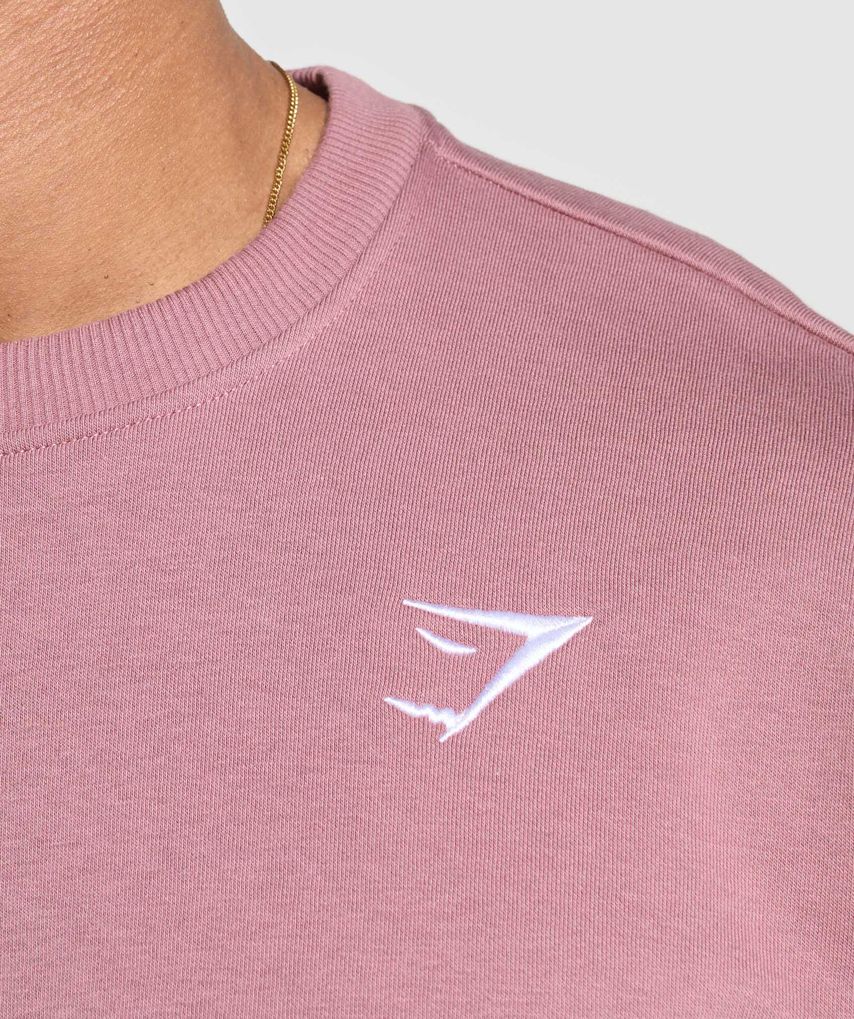 gymshark-oversized-crest-crew-calm-pink-ss25