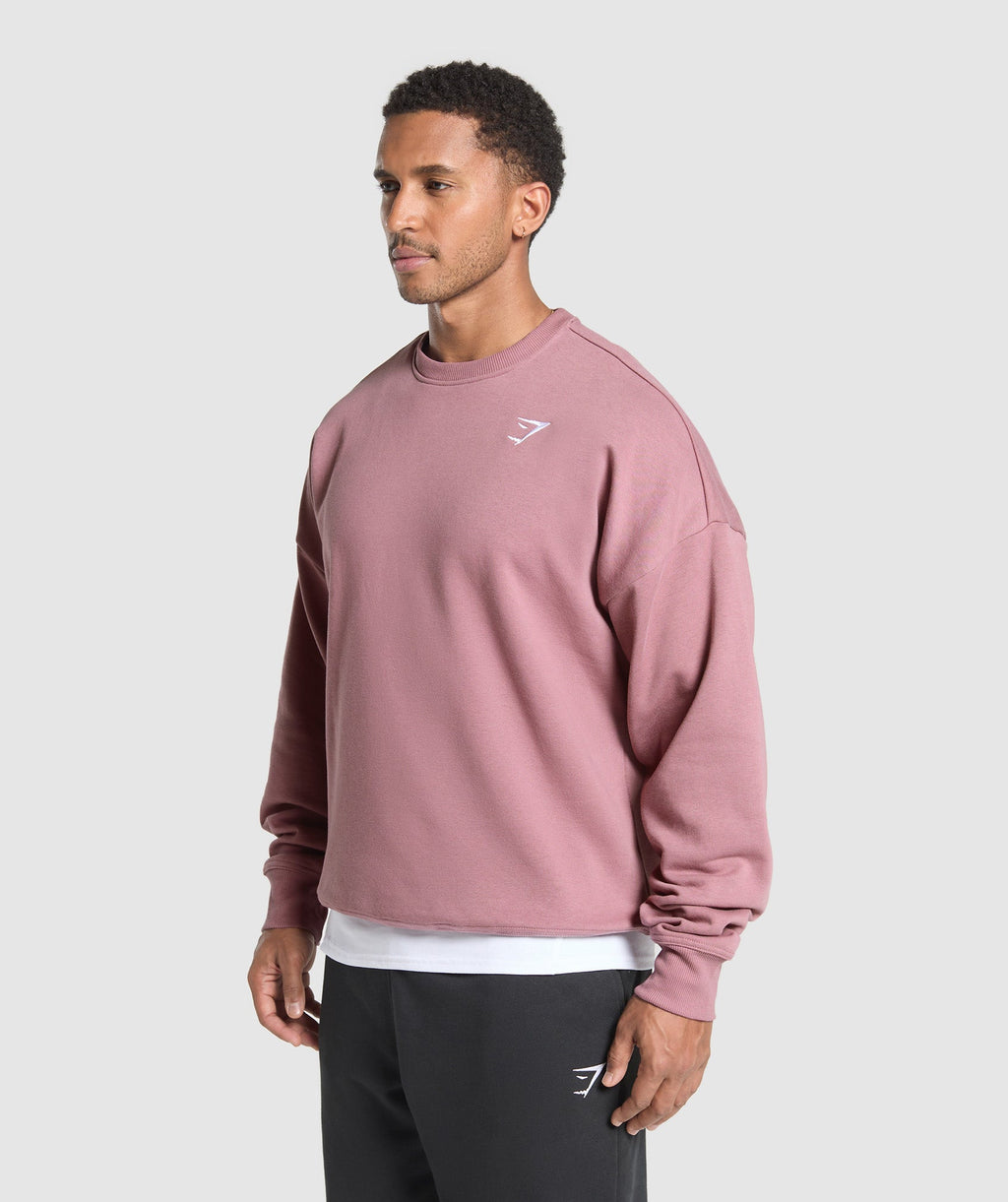 gymshark-oversized-crest-crew-calm-pink-ss25