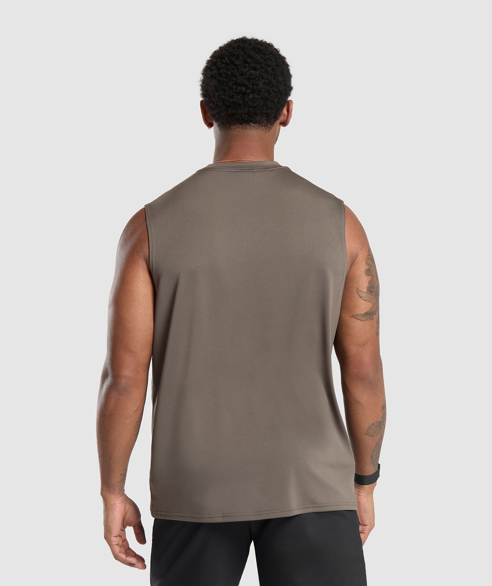 gymshark-oversized-performance-tank-camo-brown-ss24