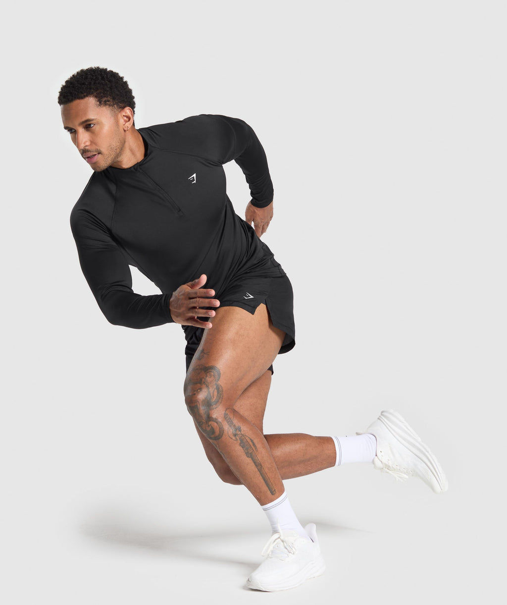 gymshark-performance-1-4-zip-black-aw24