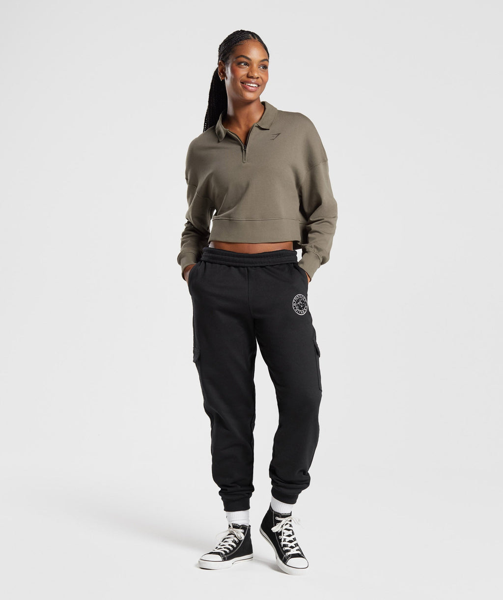 gymshark-phys-ed-graphic-1-4-zip-camo-brown-aw23
