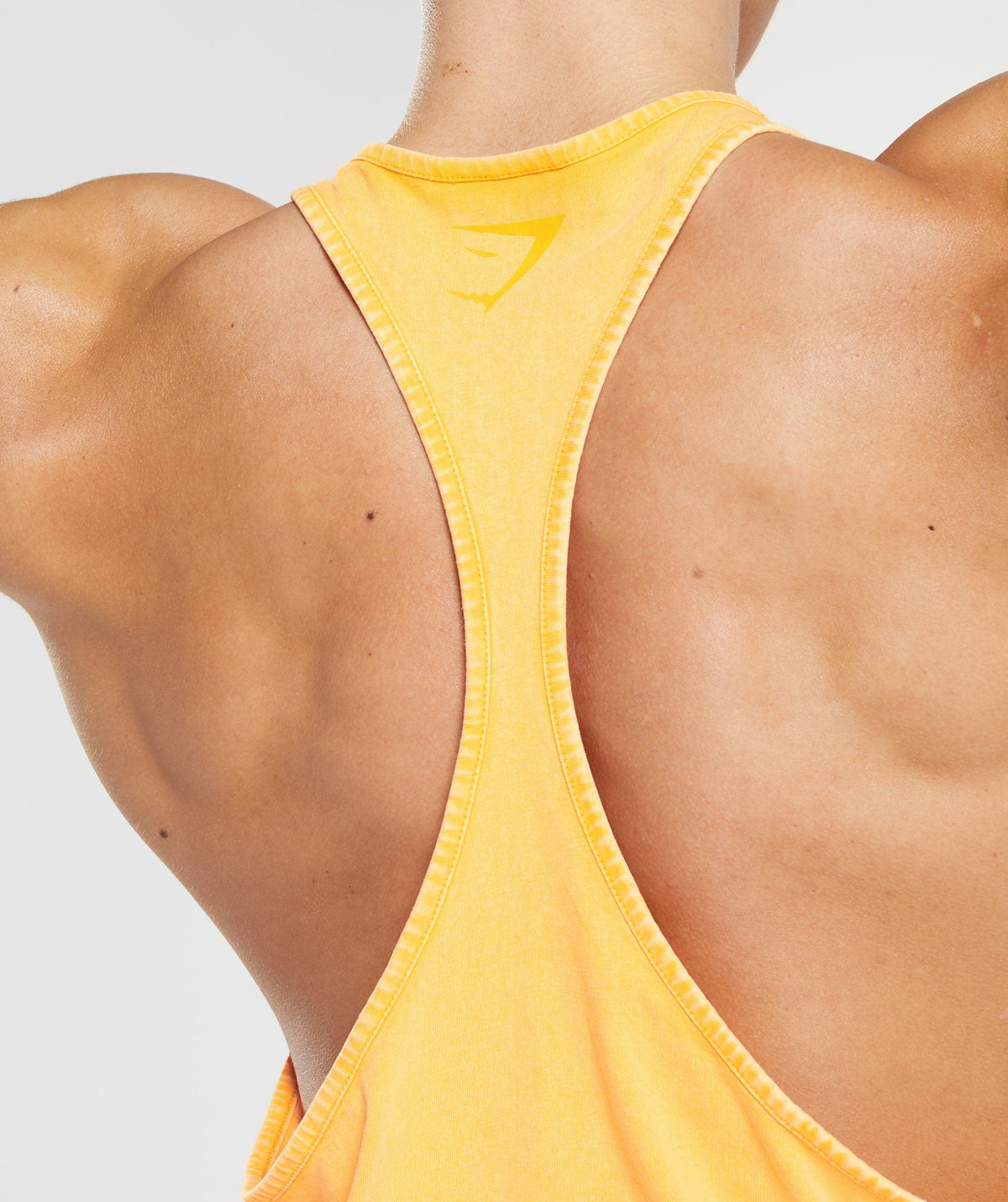 gymshark-power-washed-stringer-sunny-yellow-ss23