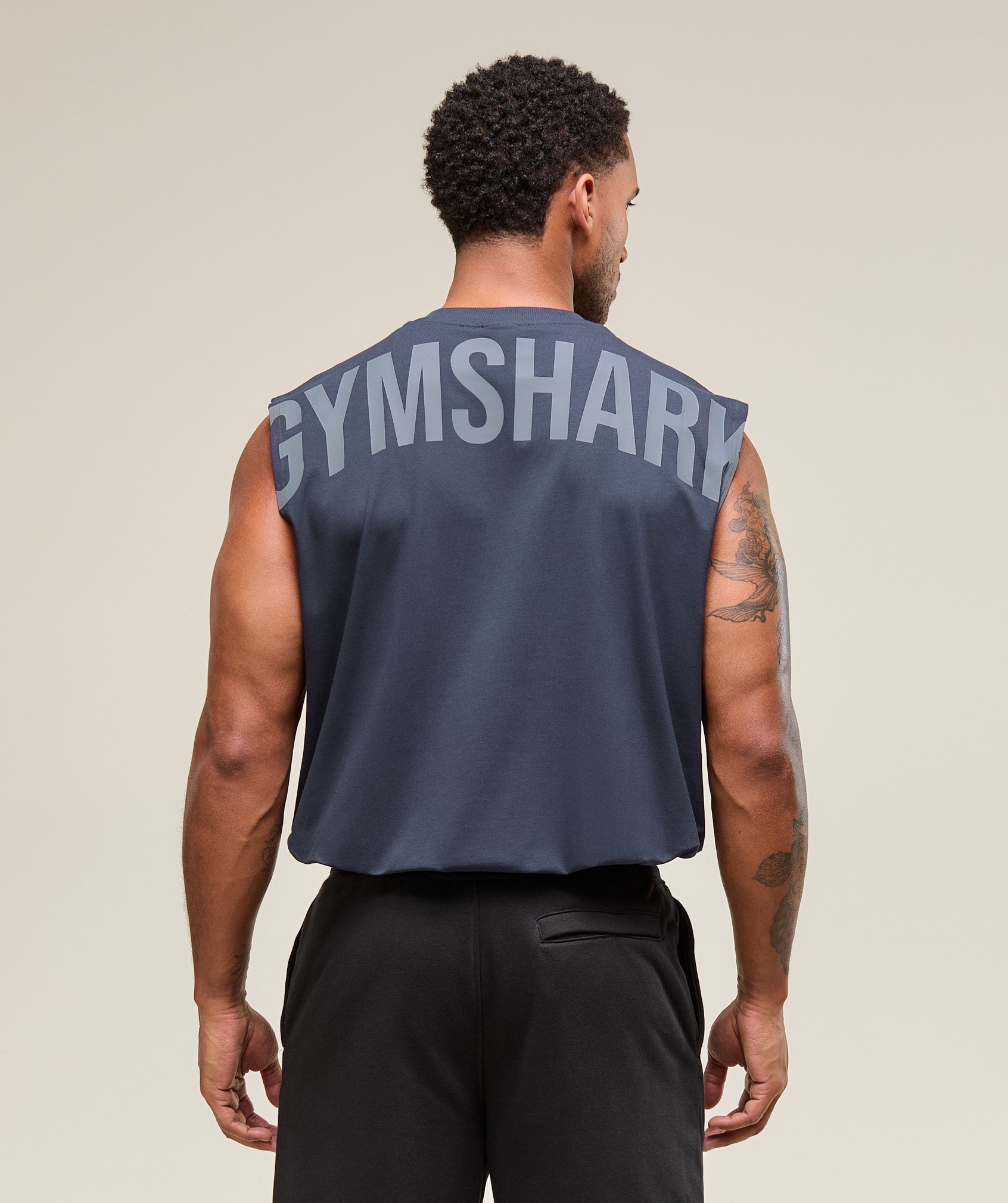 gymshark-power-cut-off-tank-heavy-blue-ss25