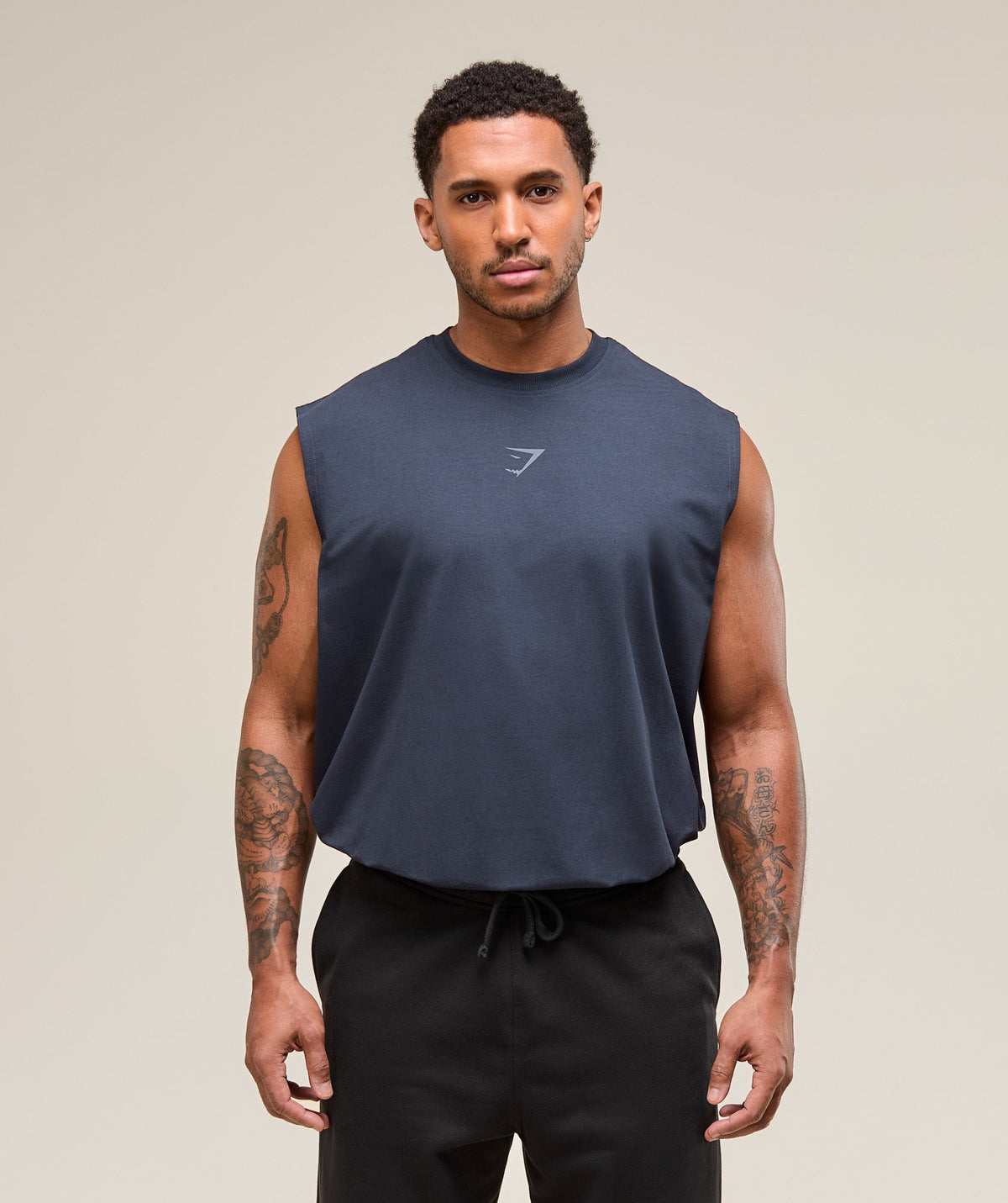 gymshark-power-cut-off-tank-heavy-blue-ss25