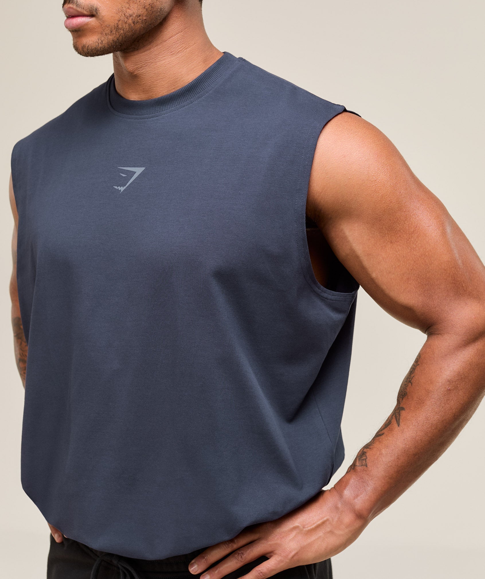 gymshark-power-cut-off-tank-heavy-blue-ss25