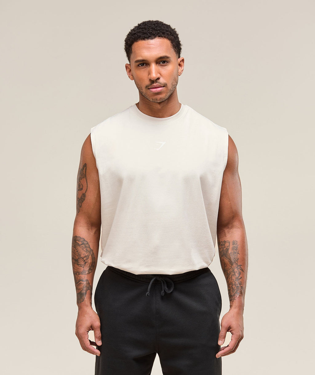 gymshark-power-cut-off-tank-oat-white-ss25