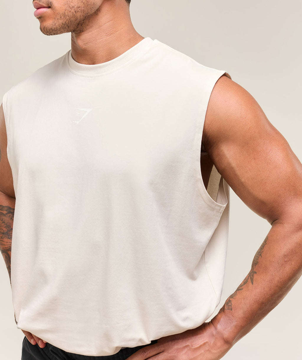 gymshark-power-cut-off-tank-oat-white-ss25