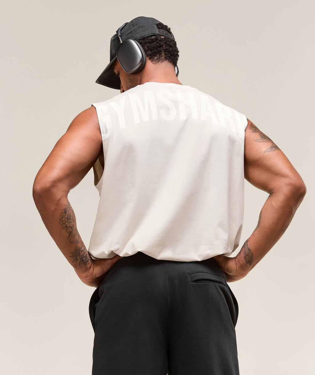 gymshark-power-cut-off-tank-oat-white-ss25