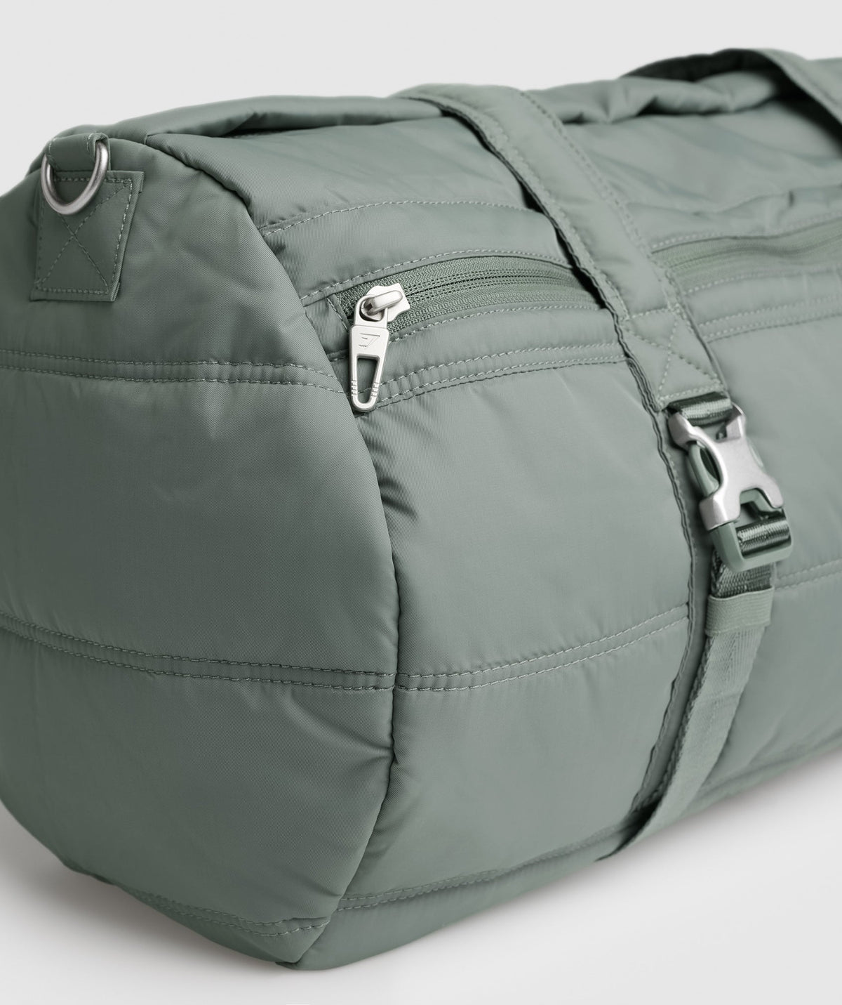 gymshark-premium-lifestyle-barrel-bag-dusk-green-aw23