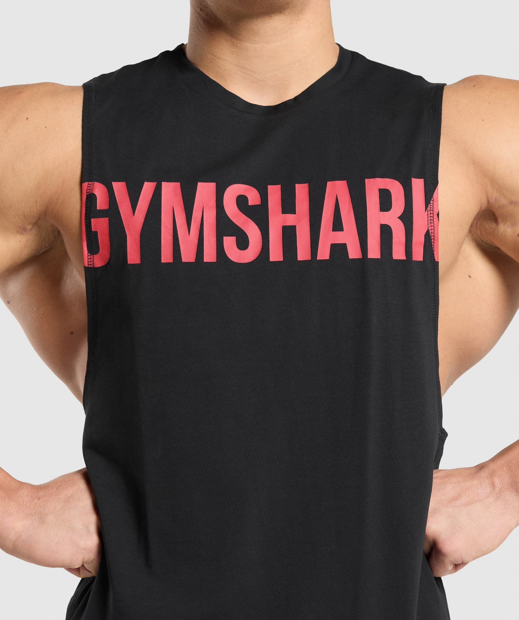 gymshark-prime-drop-arm-tank-black-vivid-red-ss25