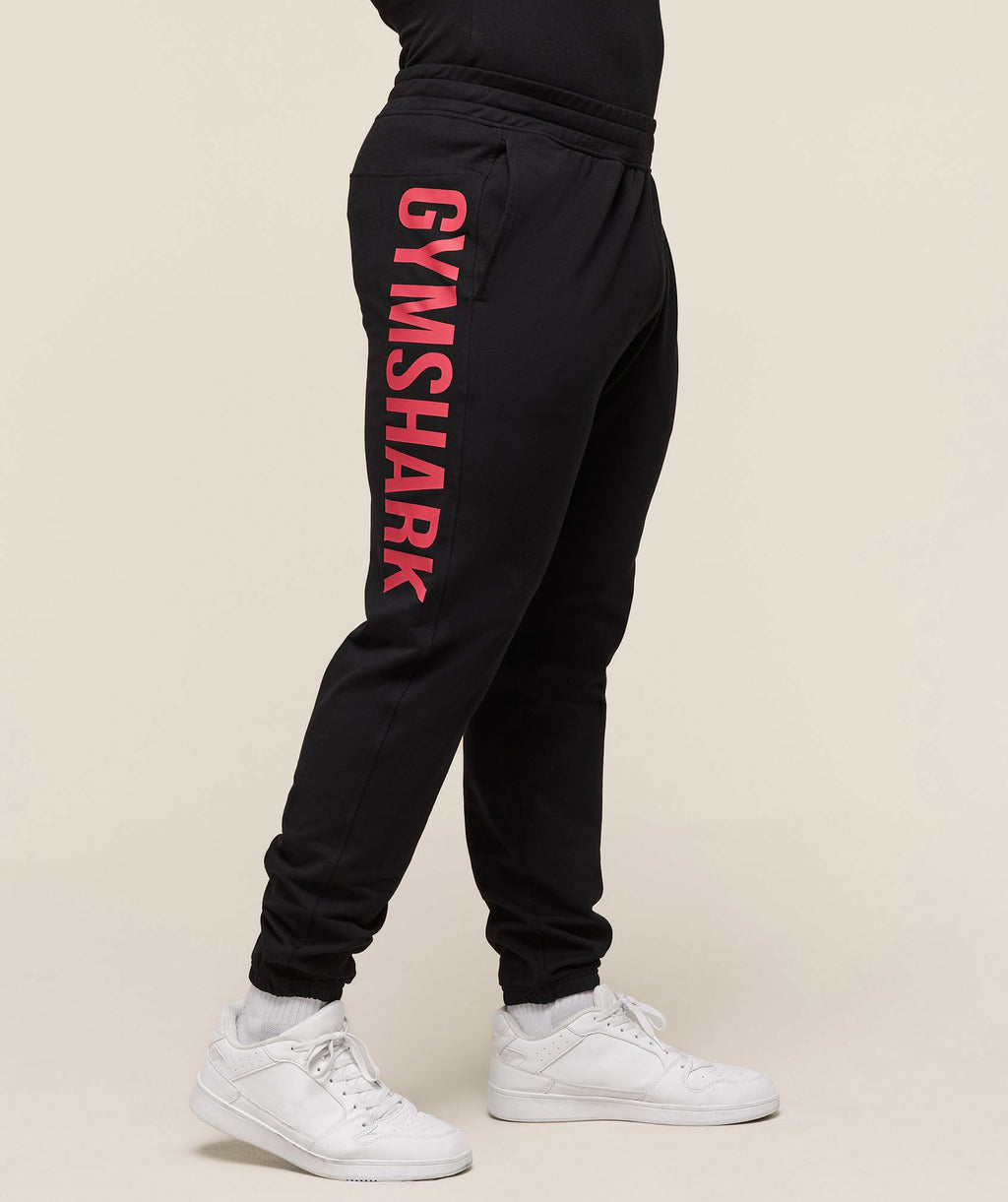 gymshark-prime-joggers-black-vivid-red-ss25