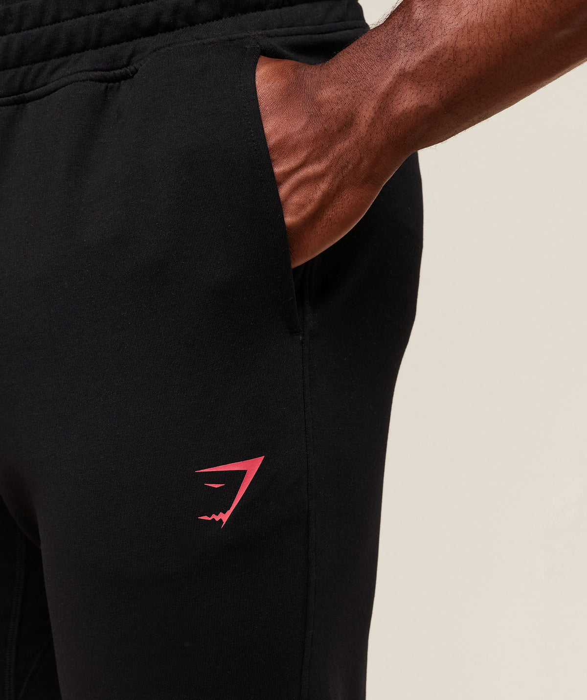 gymshark-prime-joggers-black-vivid-red-ss25