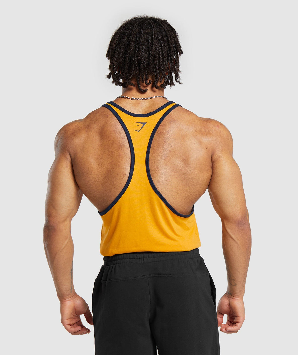 gymshark-property-of-stringer-burnt-yellow-ss24