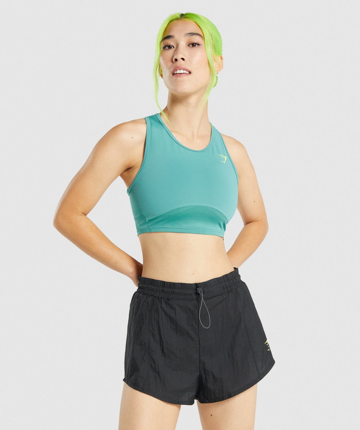 gymshark-pulse-crop-tank-teal-aw21